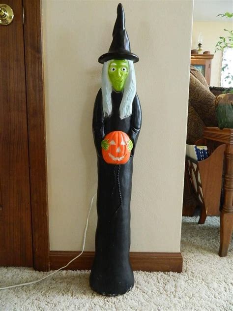 Spook Up Your Yard with Witch Blow Mold Decorations